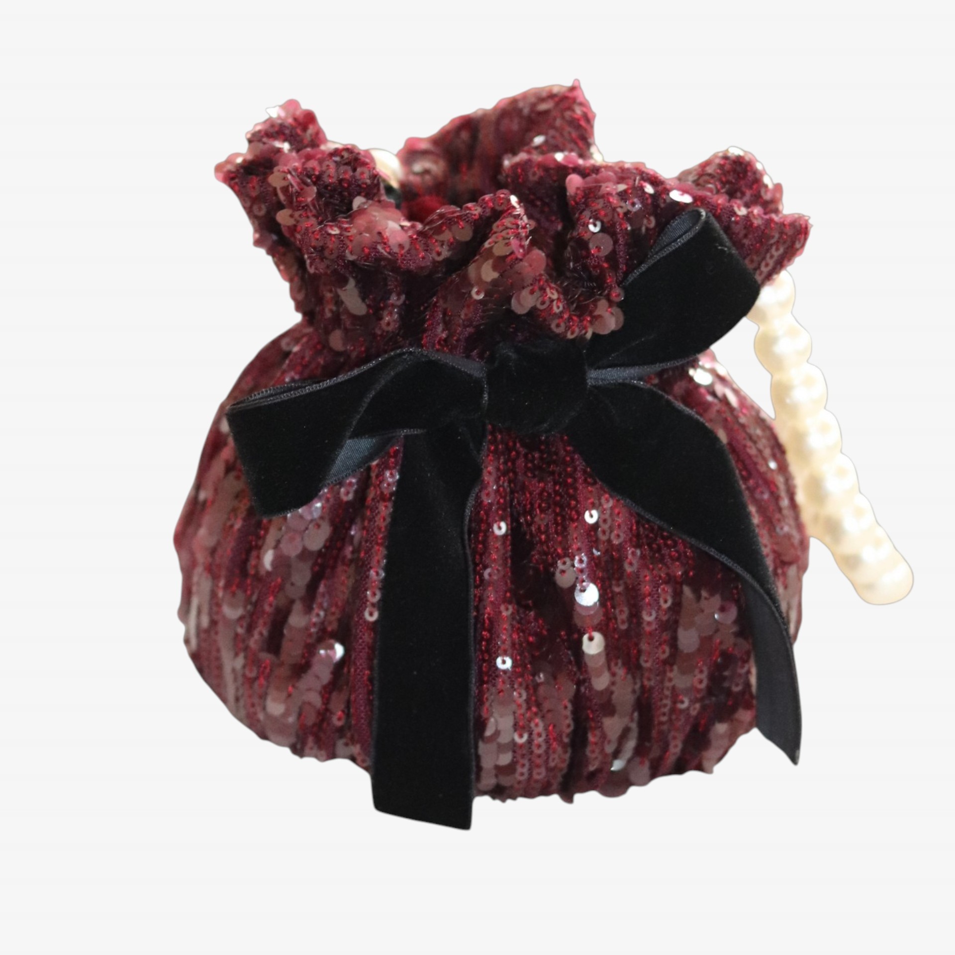 Bolsa de lantejoulas bordeaux com laço de veludo preto